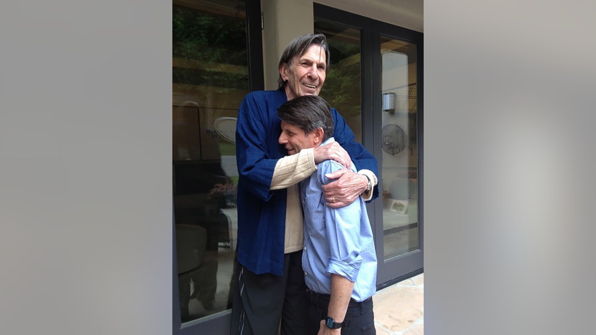 Leonard Nimoy hugging his son Adam.