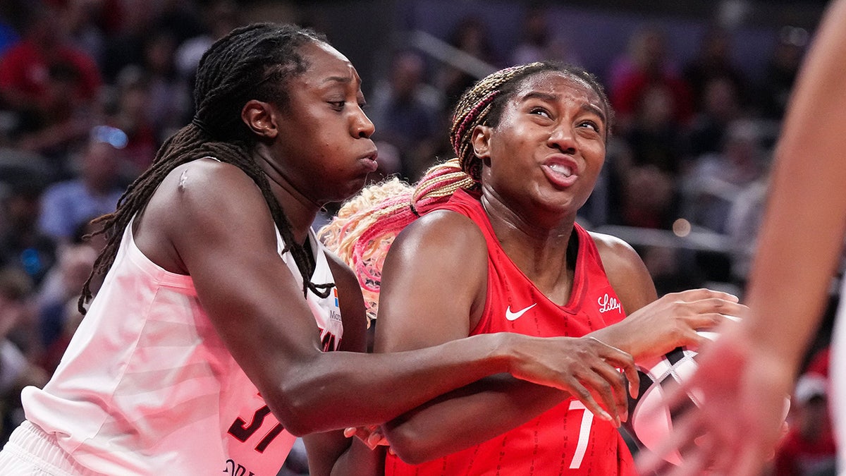 Aliyah Boston drives on Tina Charles