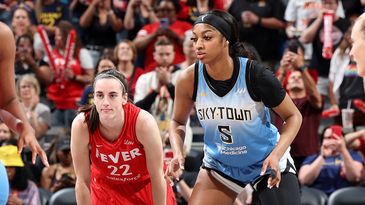 Caitlin Clark of the Fever and Angel Reese of the Sky compete during their game on June 1, 2024, in Indianapolis.