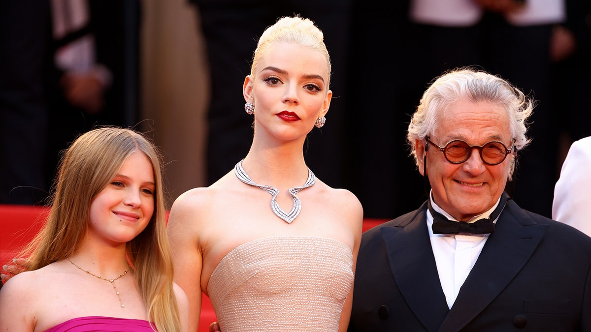 Alyla Browne, Anya Taylor-Joy and George Miller attend the "Furiosa: A Mad Max Saga" (Furiosa: Une Saga Mad Max) Red Carpet at the 77th annual Cannes Film Festival
