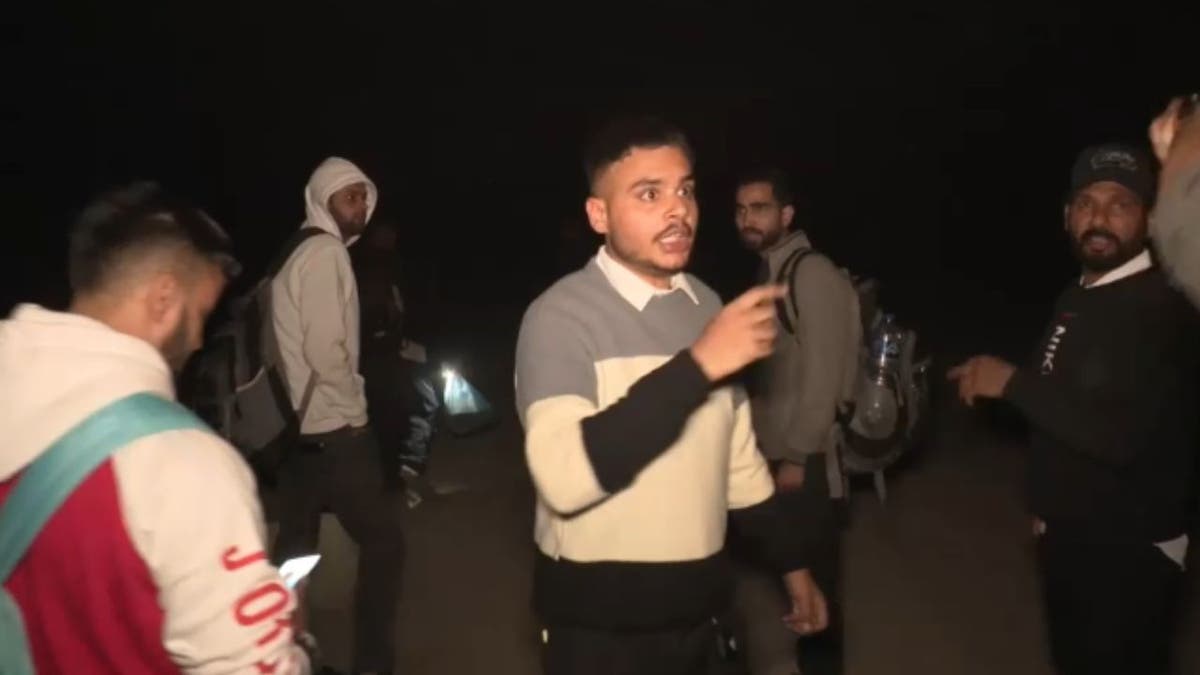Migrants asking for directions at border