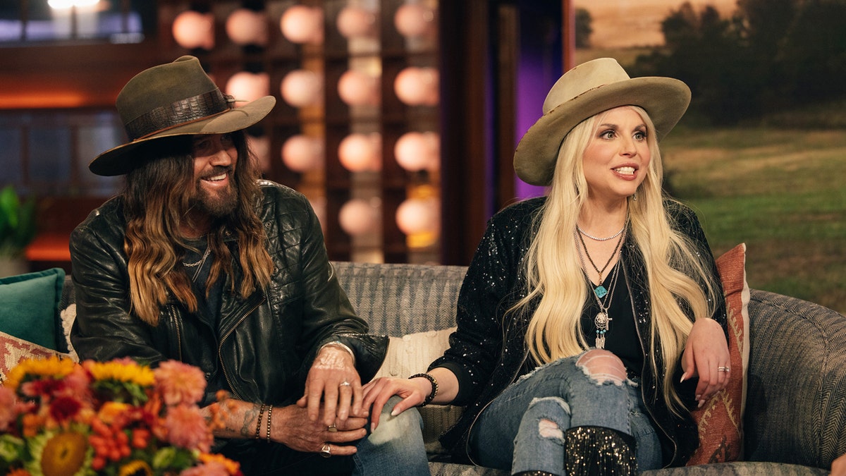 Billy Ray Cyrus and Firerose appear on TV