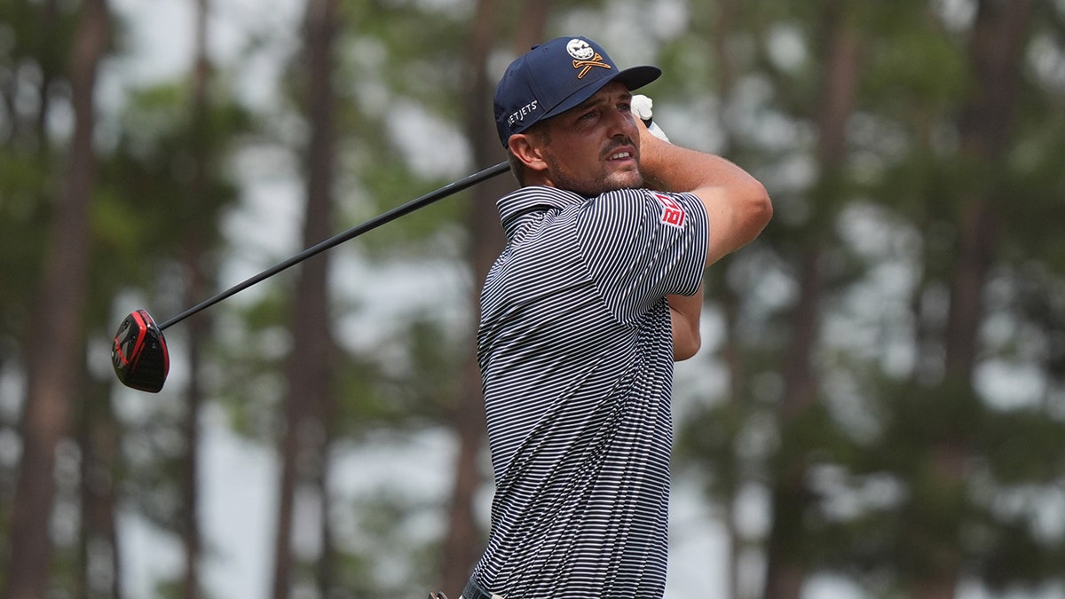 Bryson DeChambeau swings