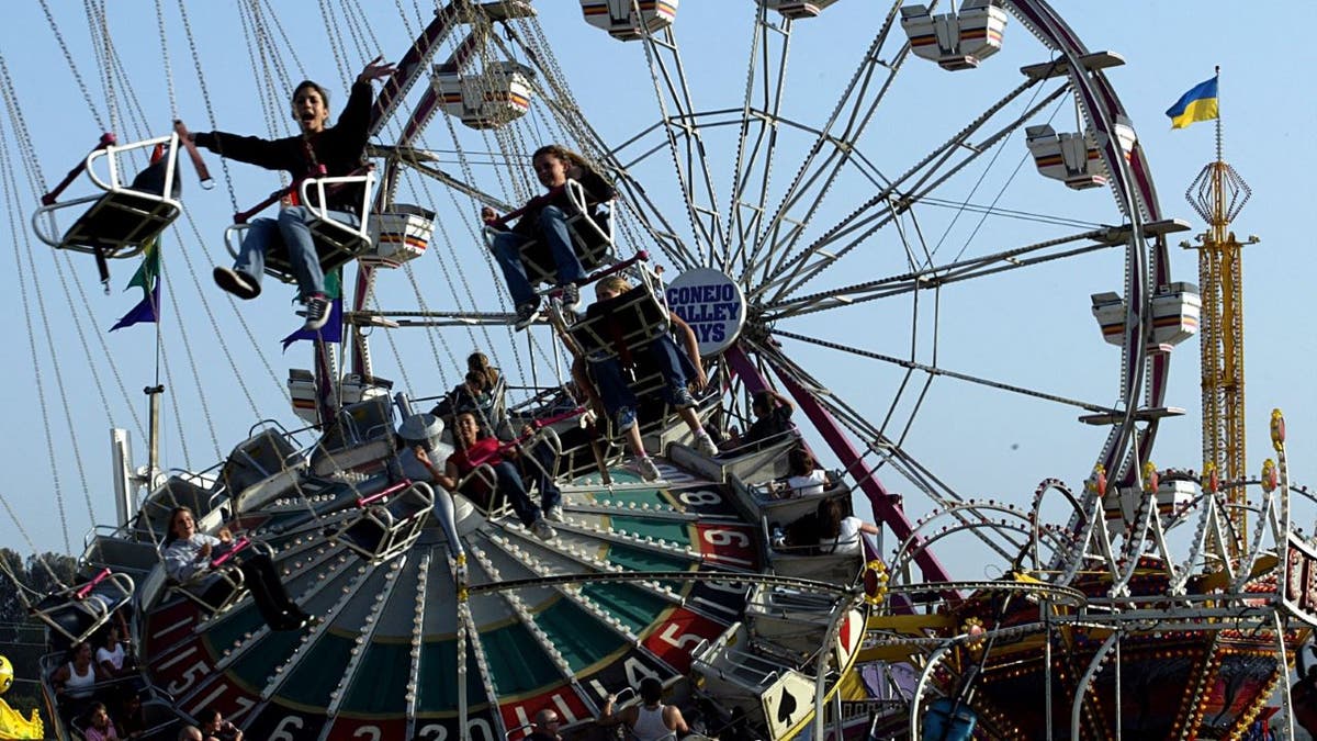 Stock image of kids on ride at Conejo Valley Days