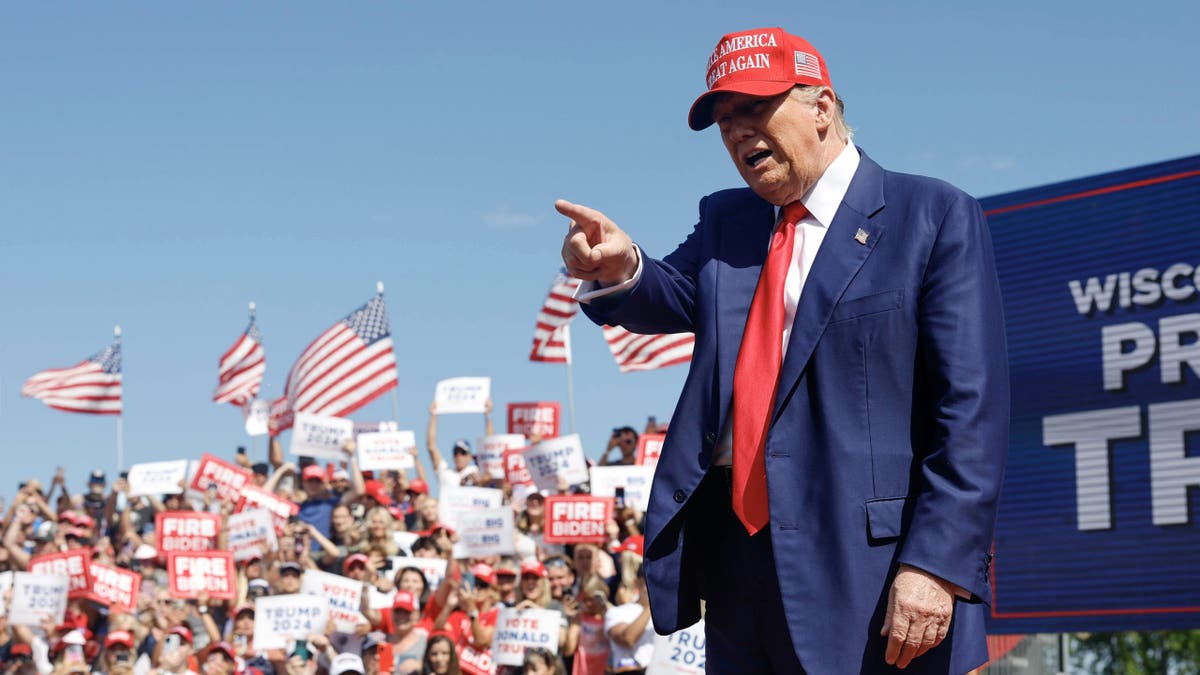 Republican presidential candidate former President Donald Trump walks to the podium at a campaign event Tuesday, June 18, 2024, in Racine, Wisconsin. (AP Photo/Jeffrey Phelps)