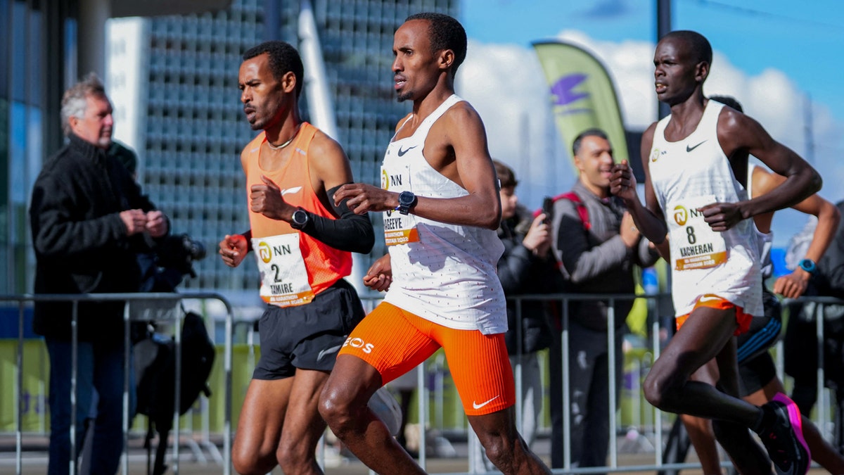 Dutch runner Abdi Nageeye wears a CGM (continuous glucose monitor) on his upper left arm as he competes in the 2022 Rotterdam marathon.