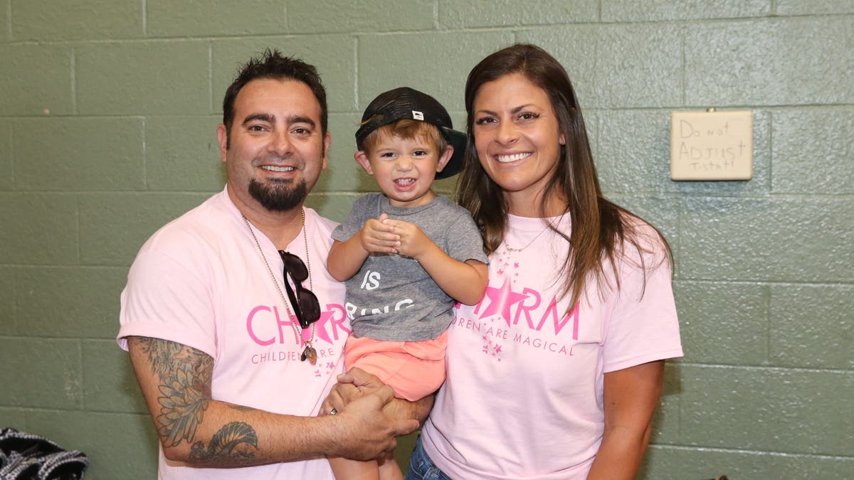 Chris Kirkpatrick with his wife and son