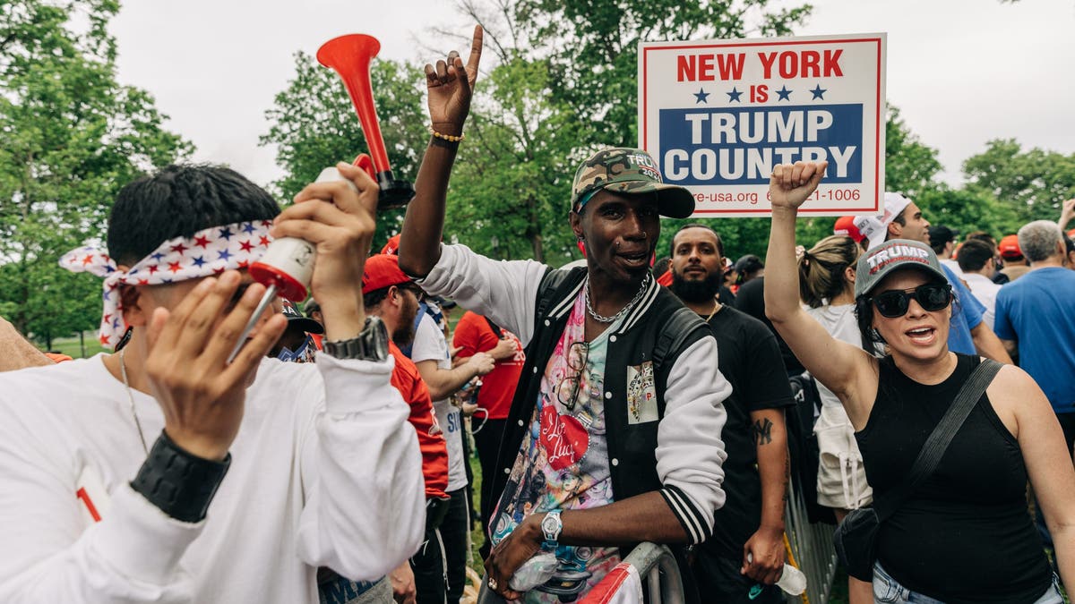 Trump supporters wait a line to attend outside Crotona Park in Bronx on May 23, 2024. (Jeenah Moon for The Washington Post via Getty Images)