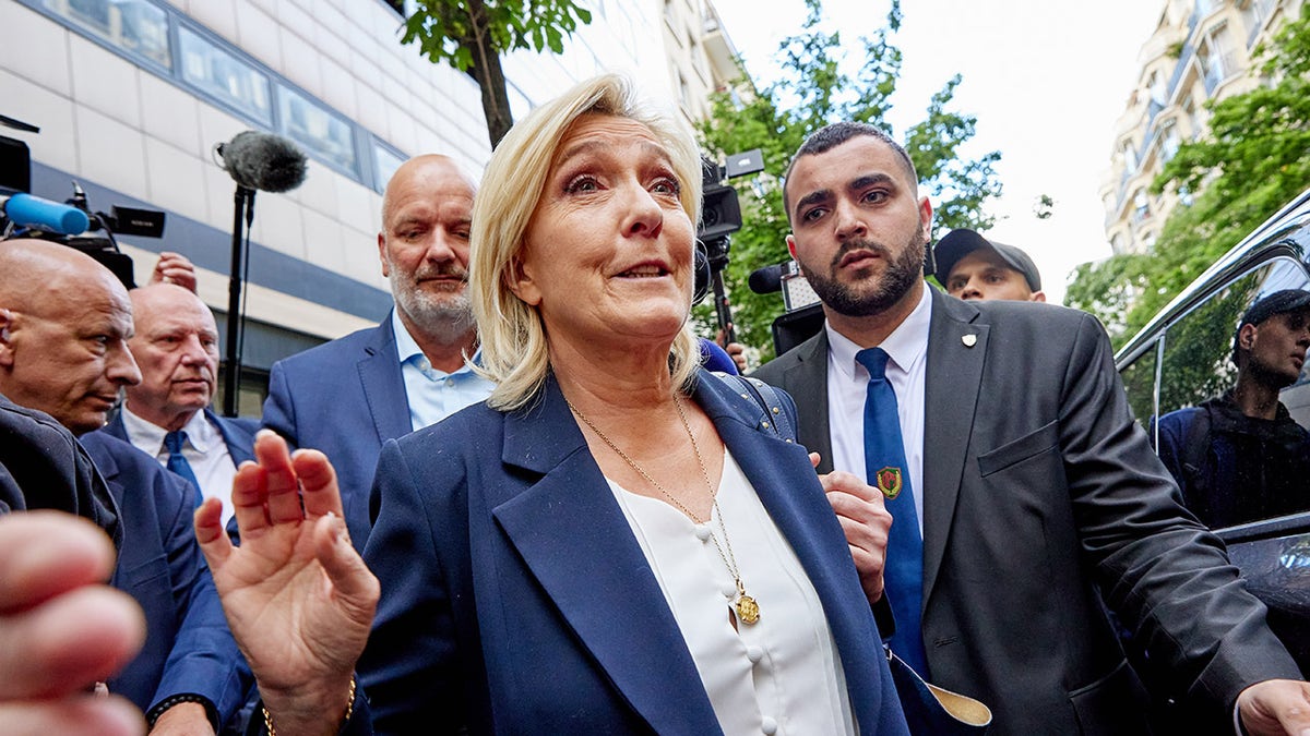 Le Pen leaves party headquarters