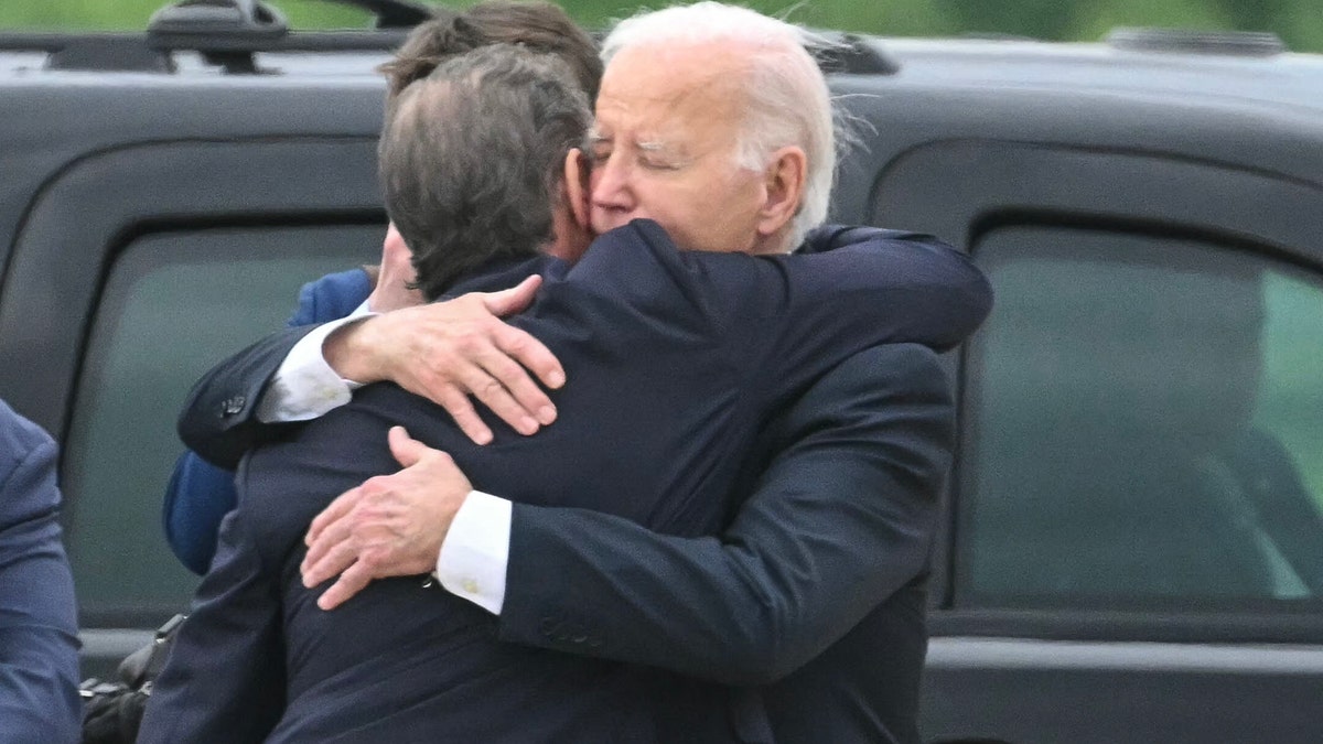 President Biden and Hunter Biden embrace.