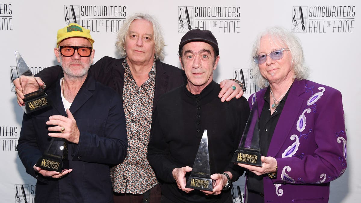 the original R.E.M. members at the songwriters hall of fame red carpet in 2024