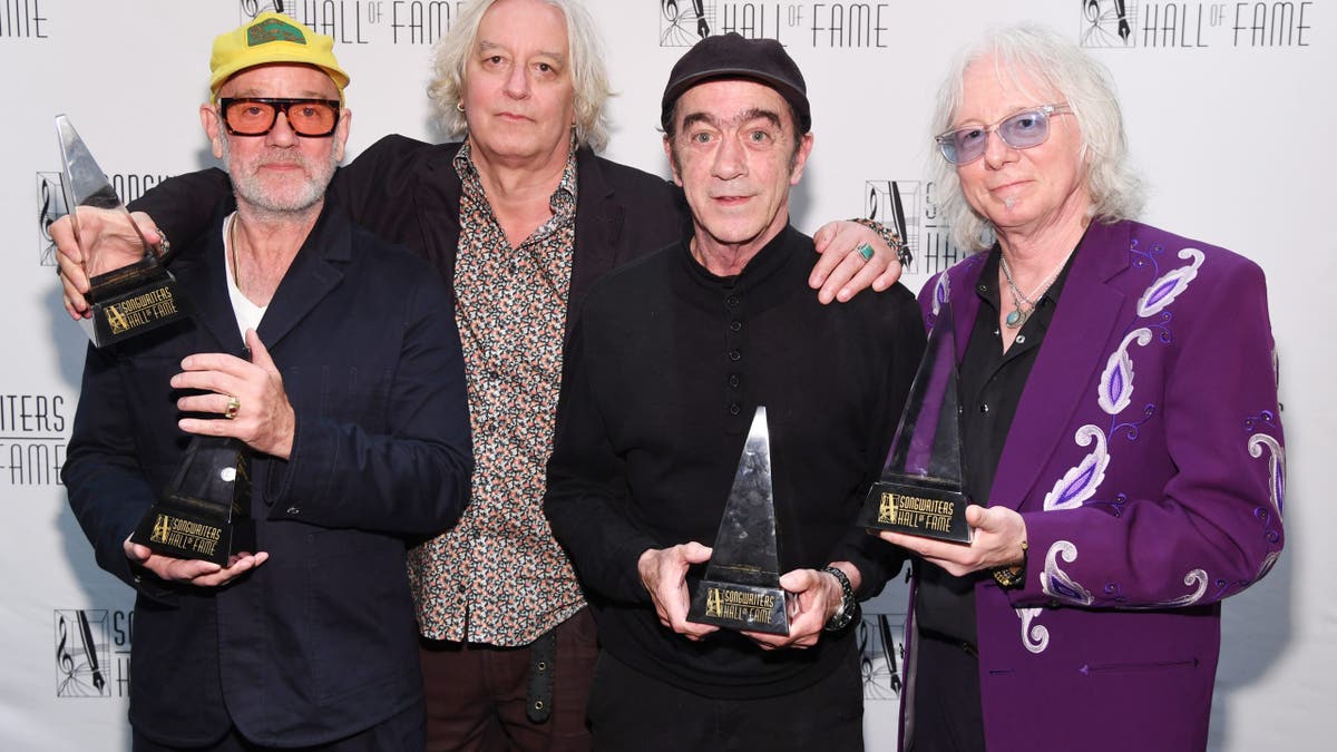 the original R.E.M. members at the songwriters hall of fame red carpet in 2024