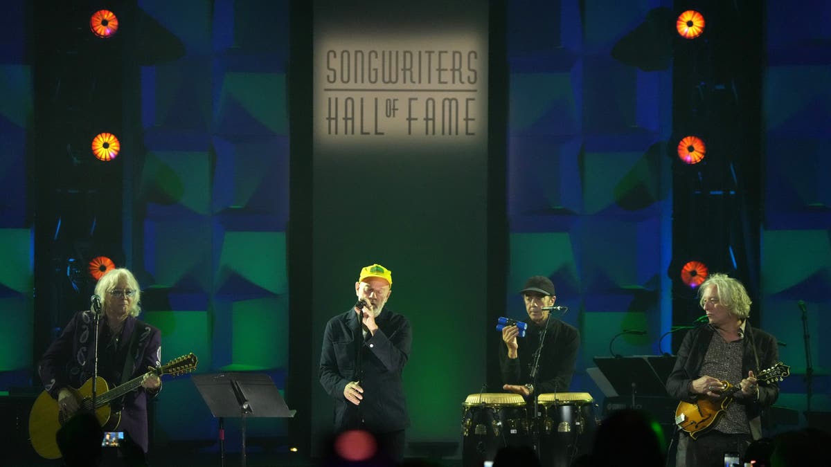 REM performing at songwriters hall of fame