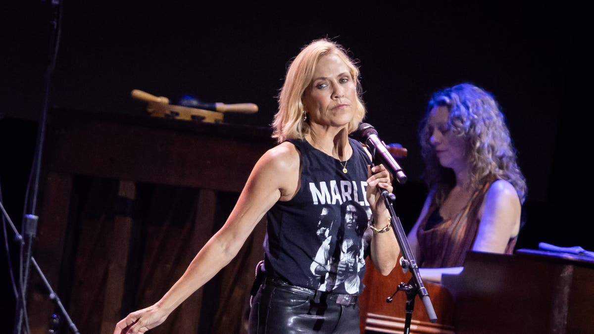 sheryl crow performing on stage