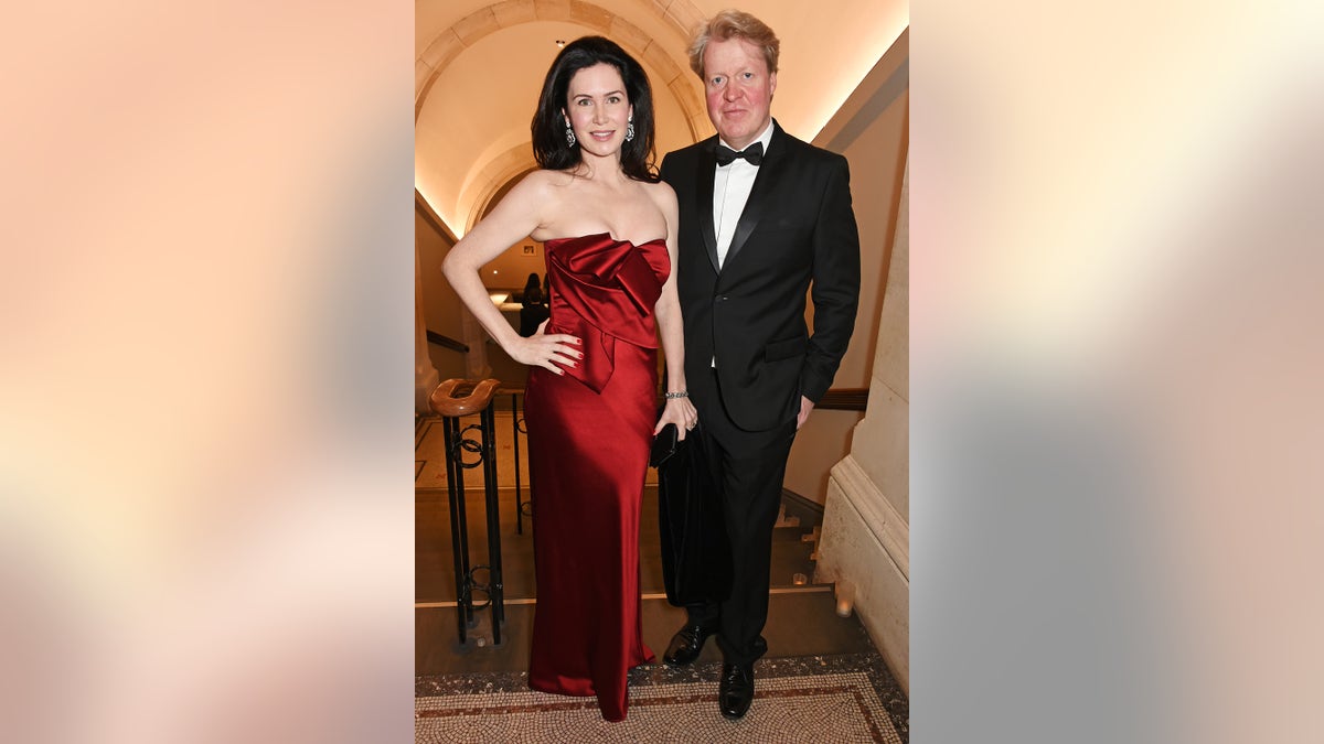 Charles Spencer wore a tux and Karen Spencer wore a strapless red dress