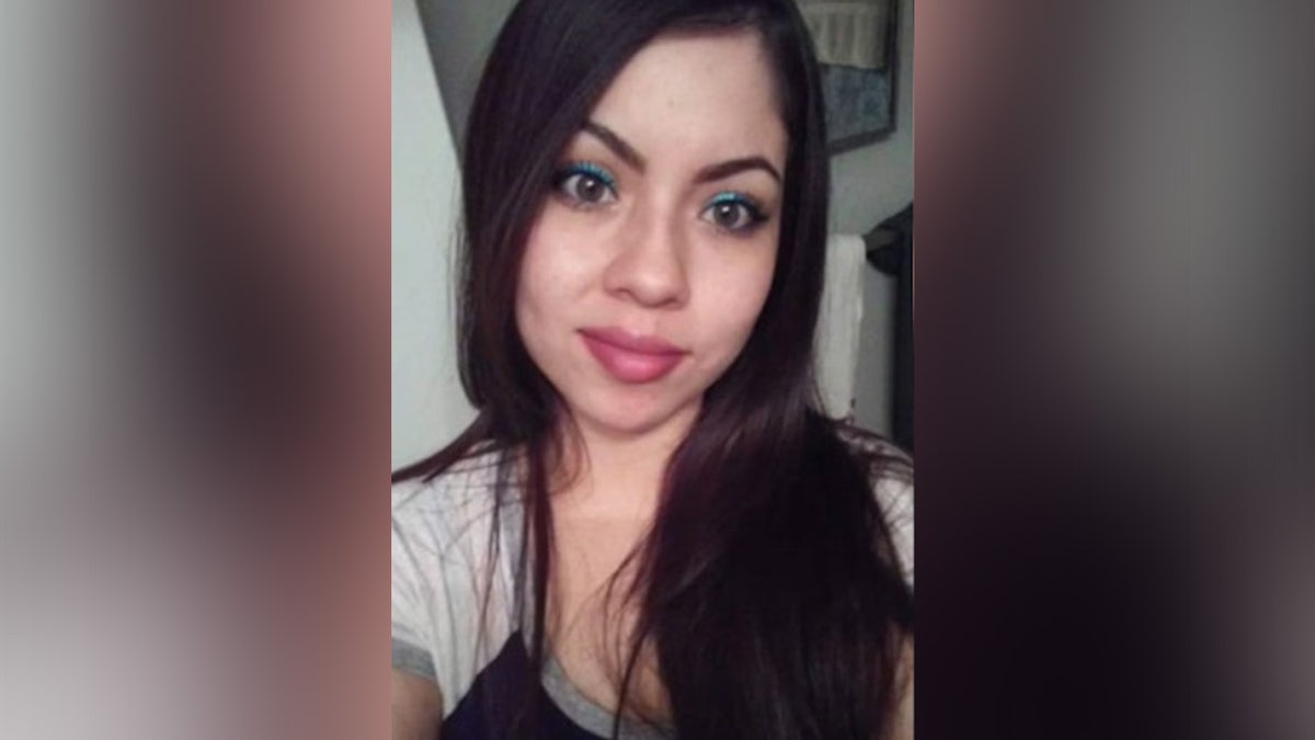Texas woman stares into camera.
