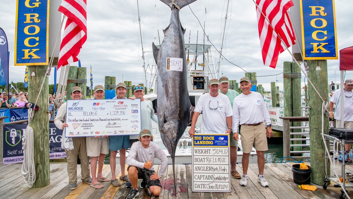 The "Release" team: Kirk Pugh, Rob Powell, Pete West, Bill Brown, Chris West, and Bert Powell are all pictured at The Big Rock Blue Marlin Tournament.