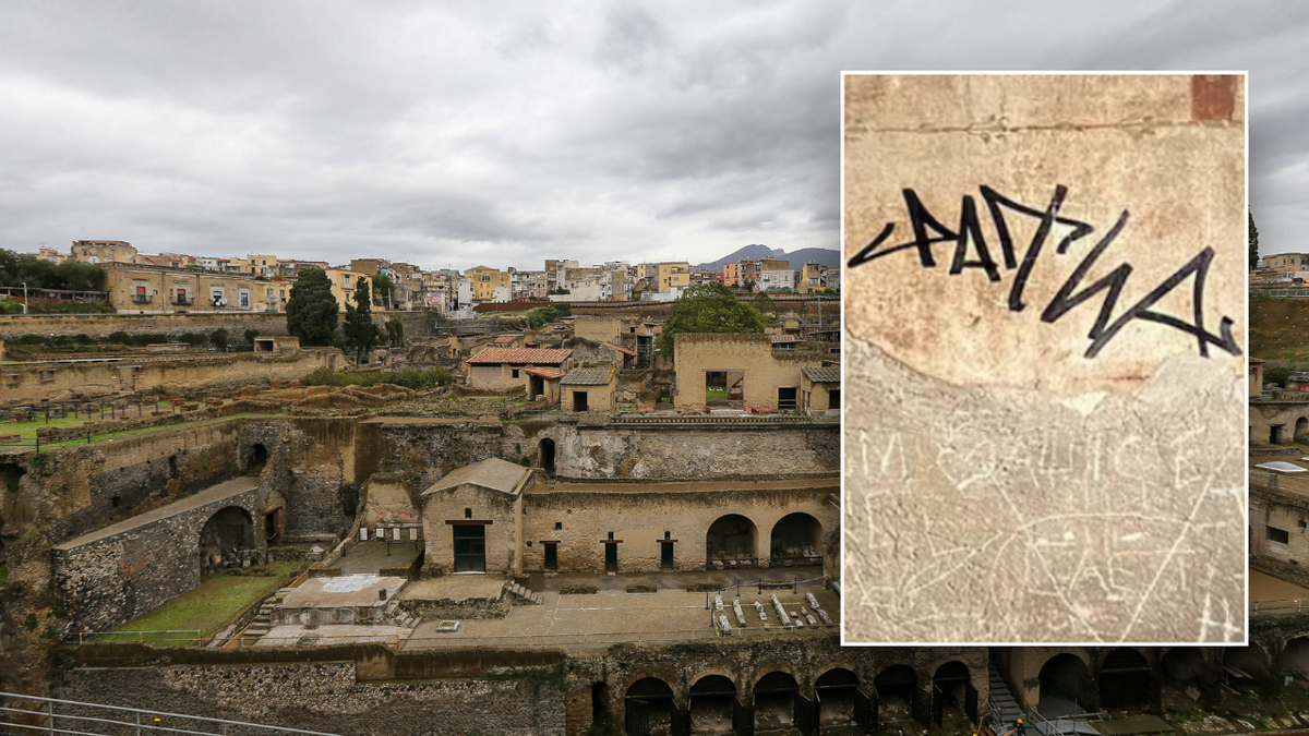 Herculaneum wall split and vandalism