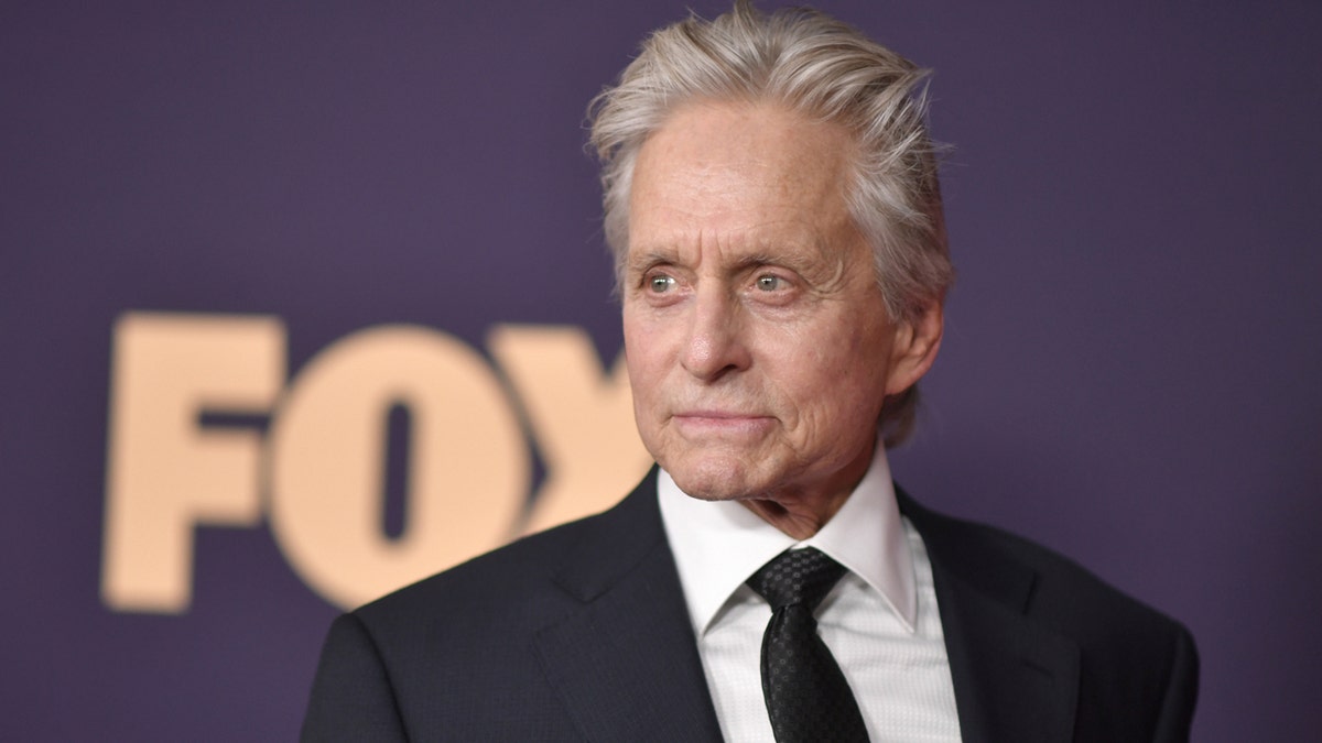 Michael Douglas arrives at the 71st Primetime Emmy Awards in a suit.