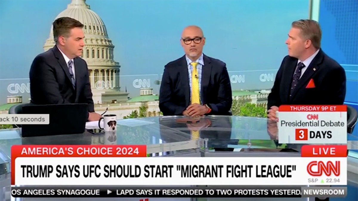 Jim Acosta and CNN panelists