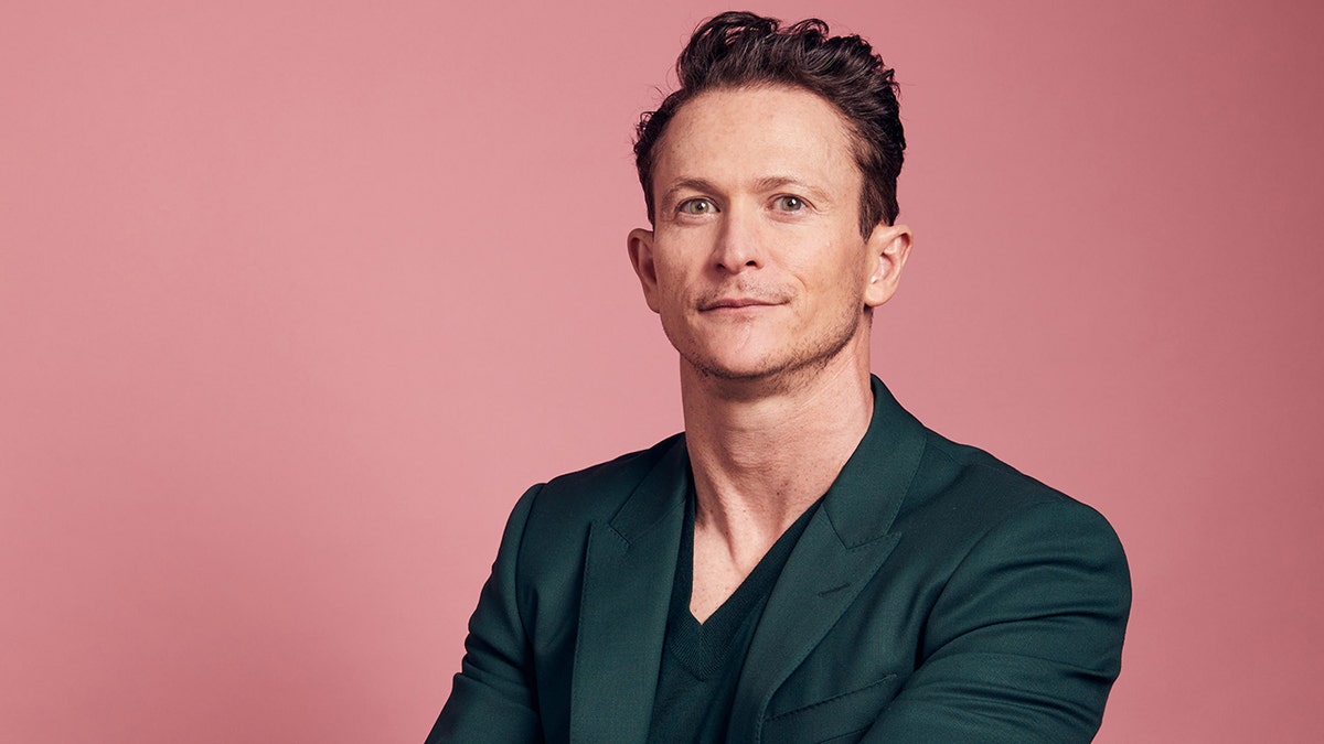 Jonathan Tucker poses for a headshot