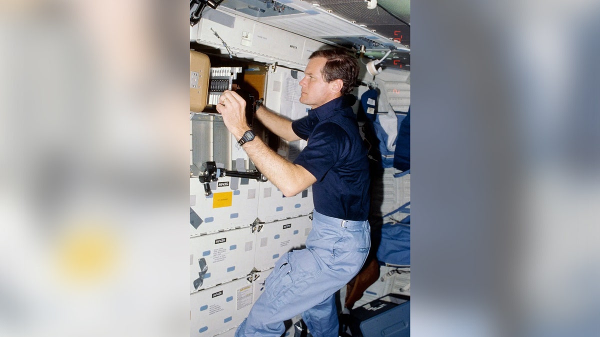 Now-NASA Administrator Bill Nelson conducts experiments on stem cells.