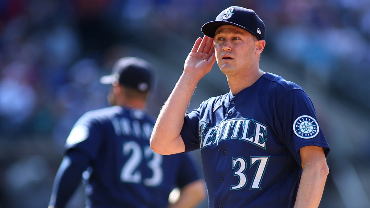 Paul Sewald with the Mariners
