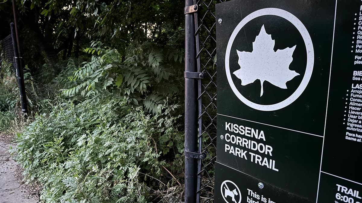 Park signage at the entrance to the trail