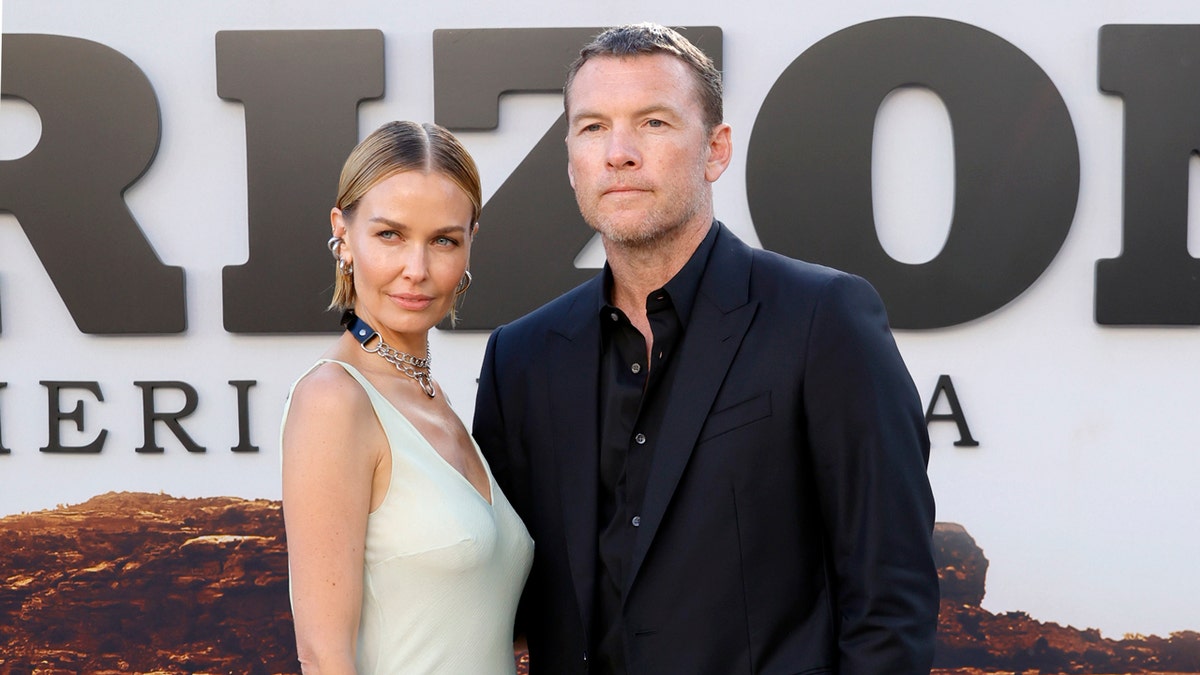 Sam Worthington is joined by his wife at the Horizon premiere