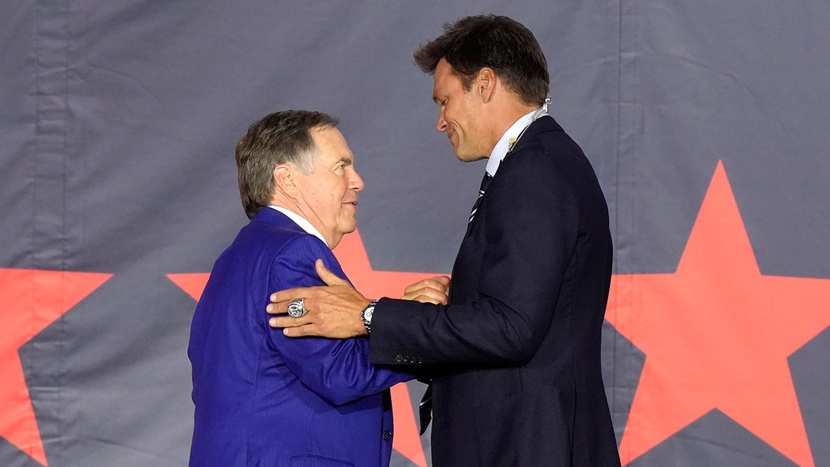 Tom Brady and Bill Belichick shake hands