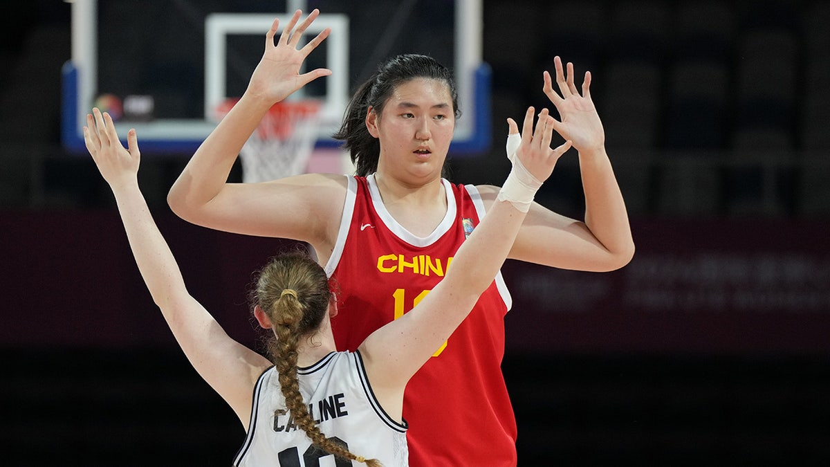 Zhang Ziyu with hands up