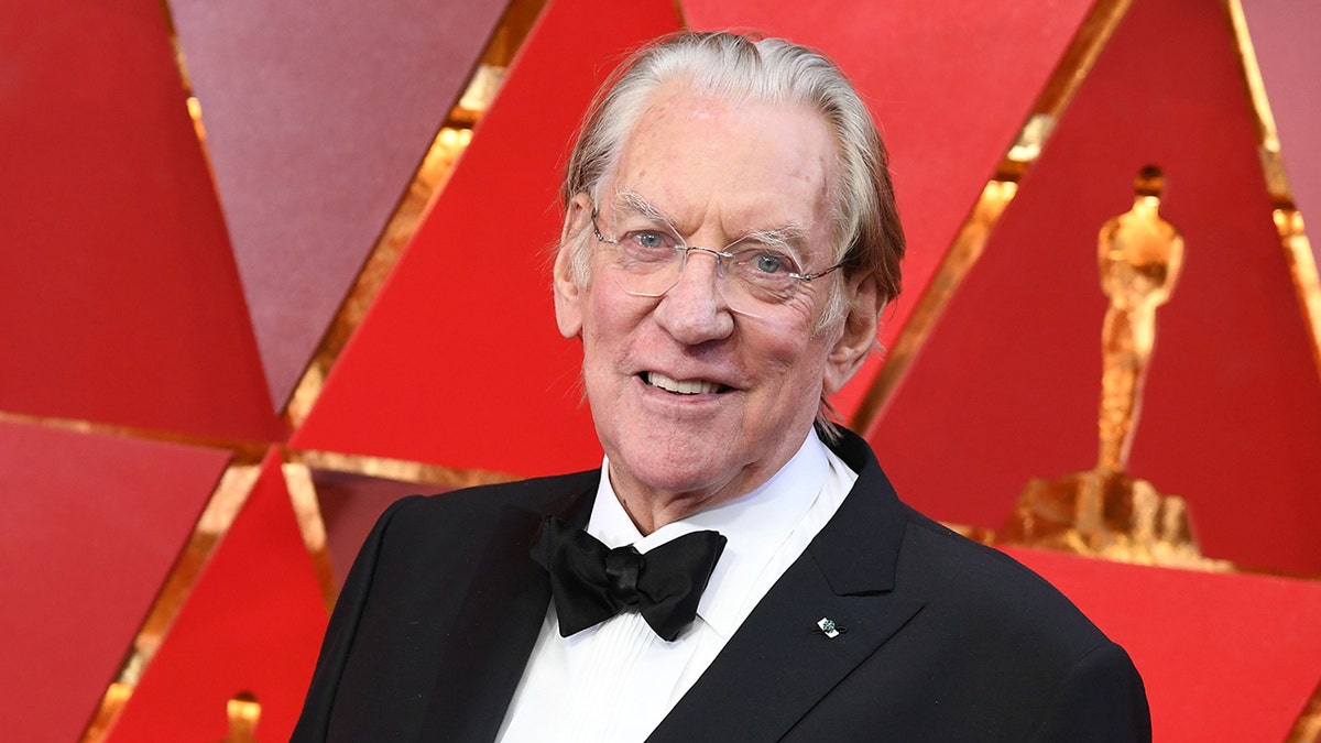 Donald Sutherland wears suit at the Oscars
