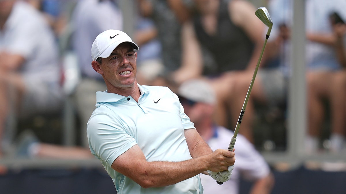 Rory McIlroy looks at shot