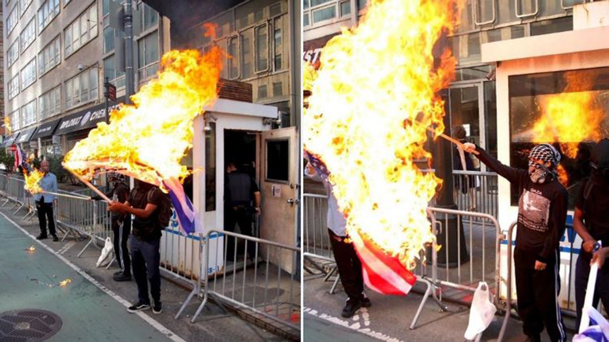 Flags being burned outside consulate
