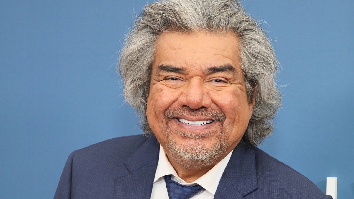 George Lopez smiling