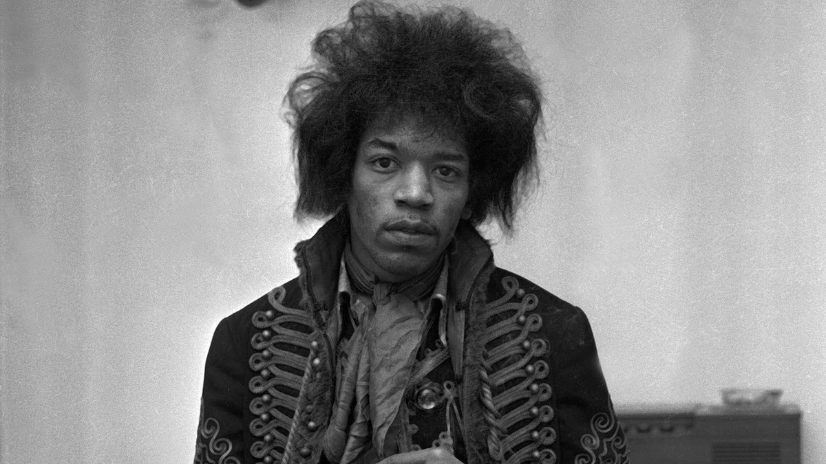 Jimi Hendrix posing for the camera