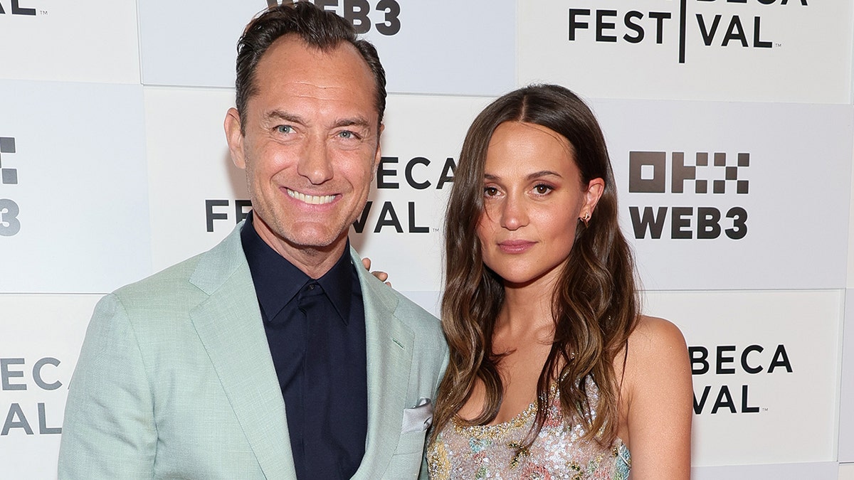 Alicia Vikander and Jude Law on the red carpet at the Tribeca Film Festival