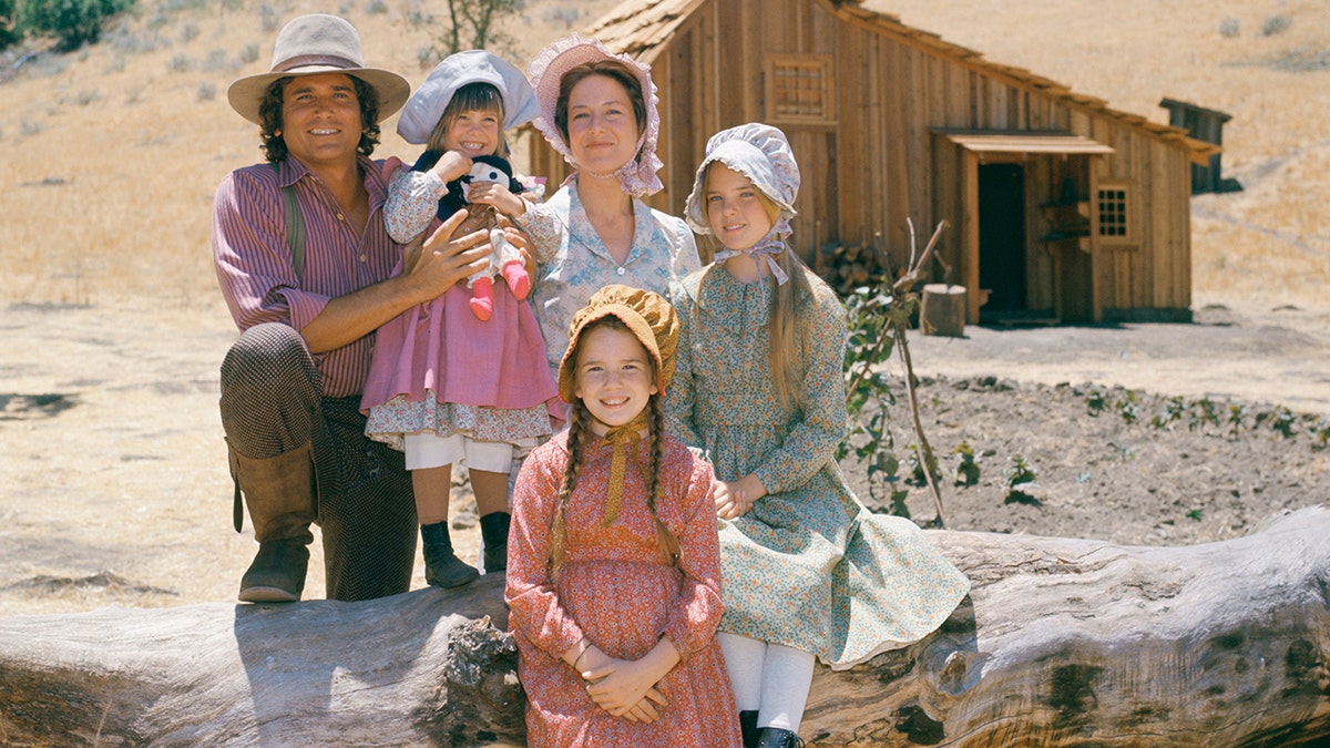 Cast of "Little House on the Prairie" posing for a photo