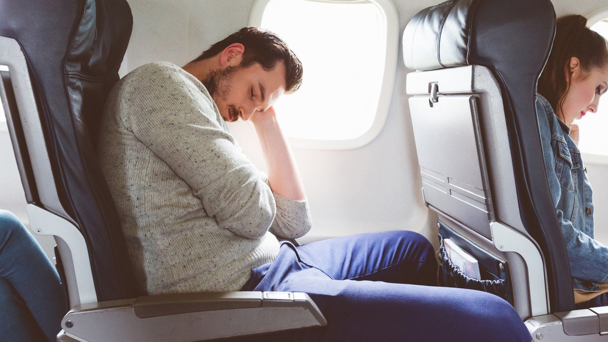 People sleep on planes