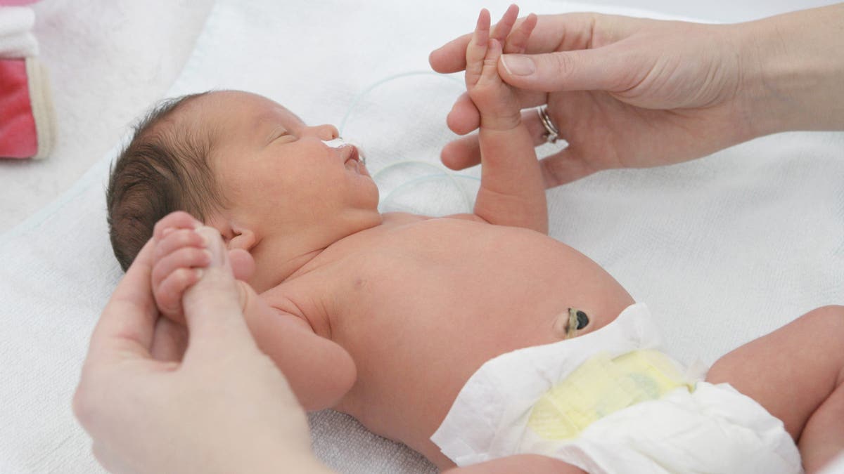 Newborn baby after umbilical cord cut