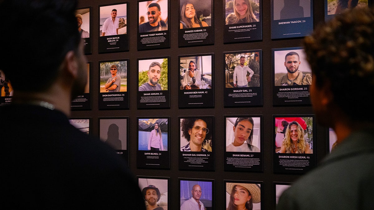 Reef Peretz, chairman of the Nova Foundation, looks at the names and faces of people killed during the Nova festival at "The Nova Music Festival Exhibition: Oct. 7 06:29 AM, The Moment Music Stood Still" on April 18, 2024, in New York City.