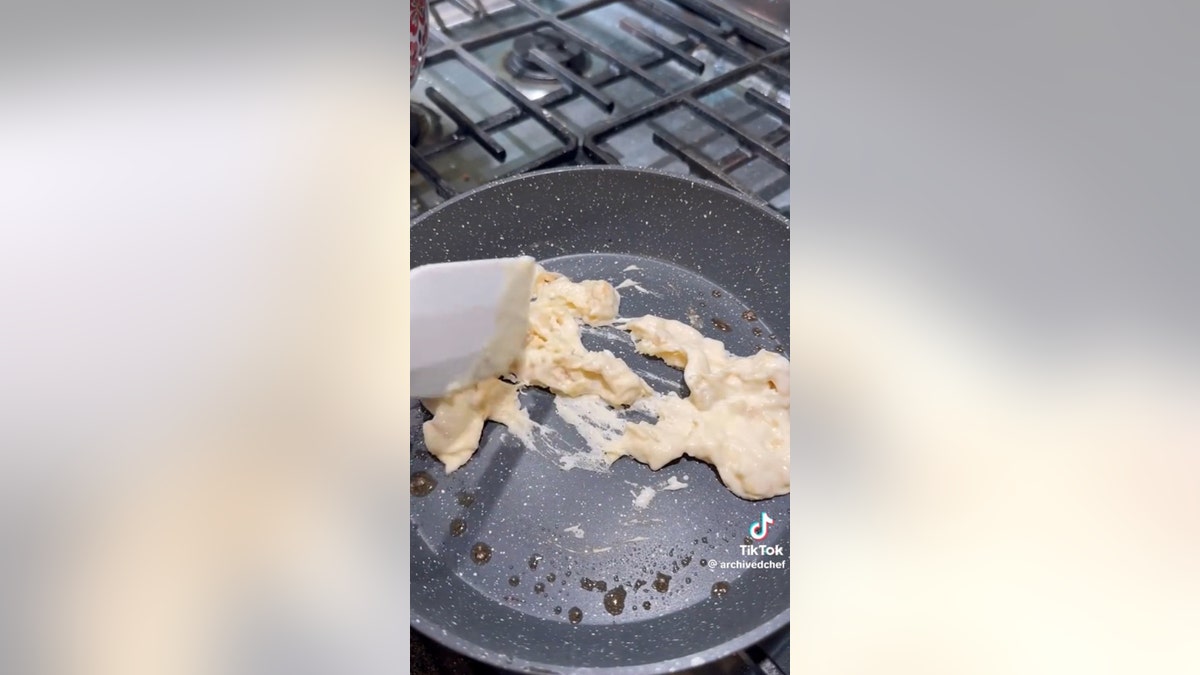 scramble pancakes in a pan