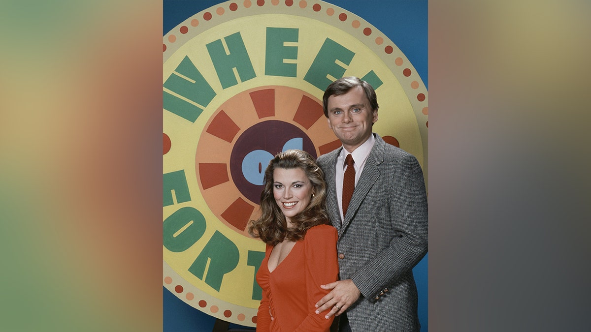 Pat Sajak and Vanna White in a promo shoot for "Wheel of Fortune."