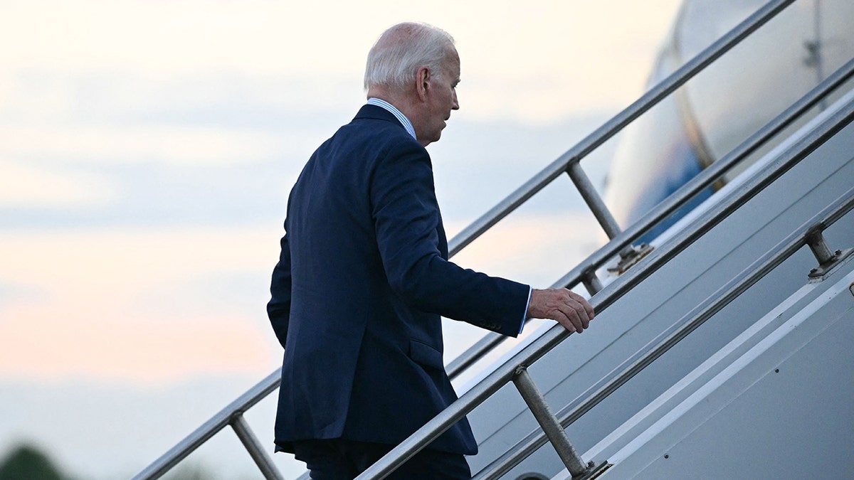 President Biden climbs aboard Air Force One
