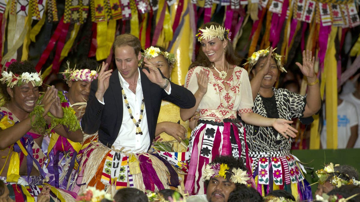 A photo of Prince William and Kate Middleton dancing