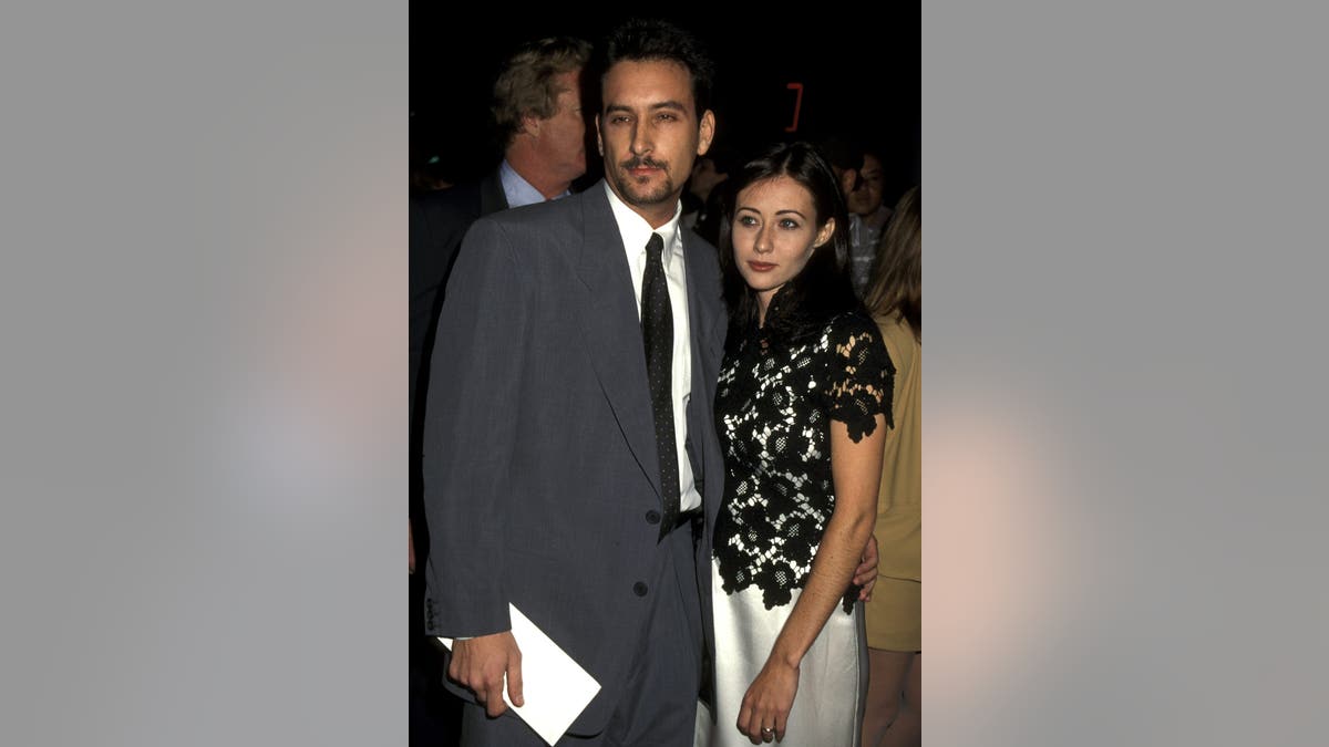 A photo of Rob Weiss and Shannen Doherty at "Mall Rats" movie premiere