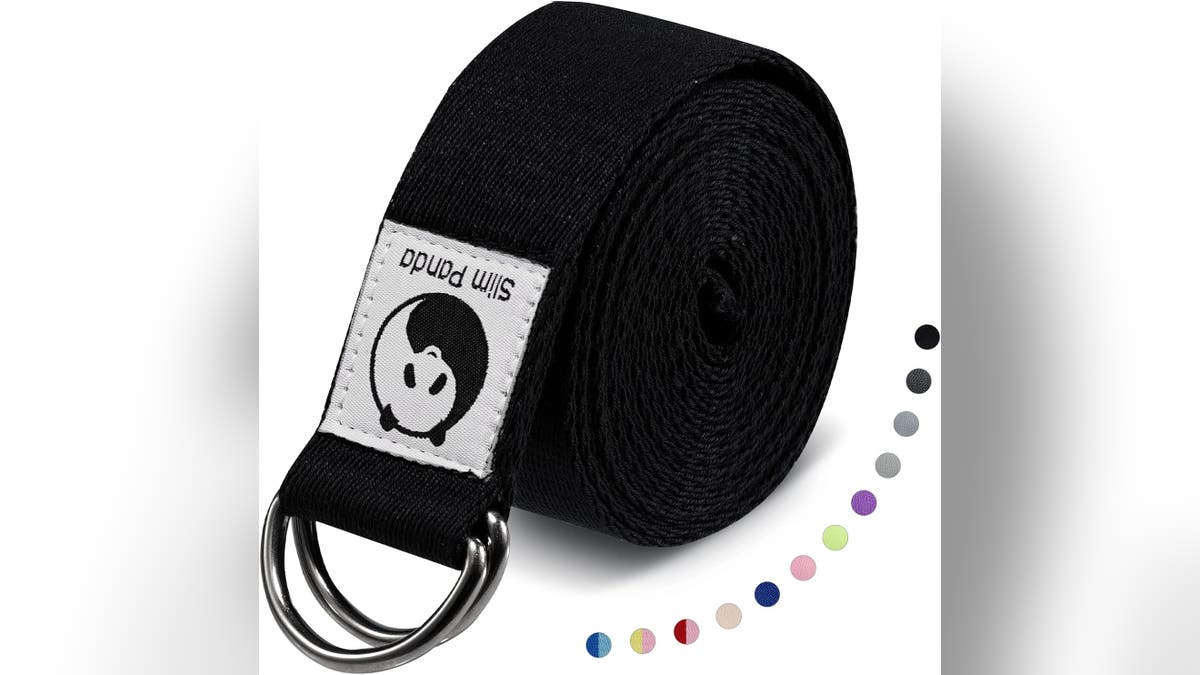 Stretch further with a yoga strap.