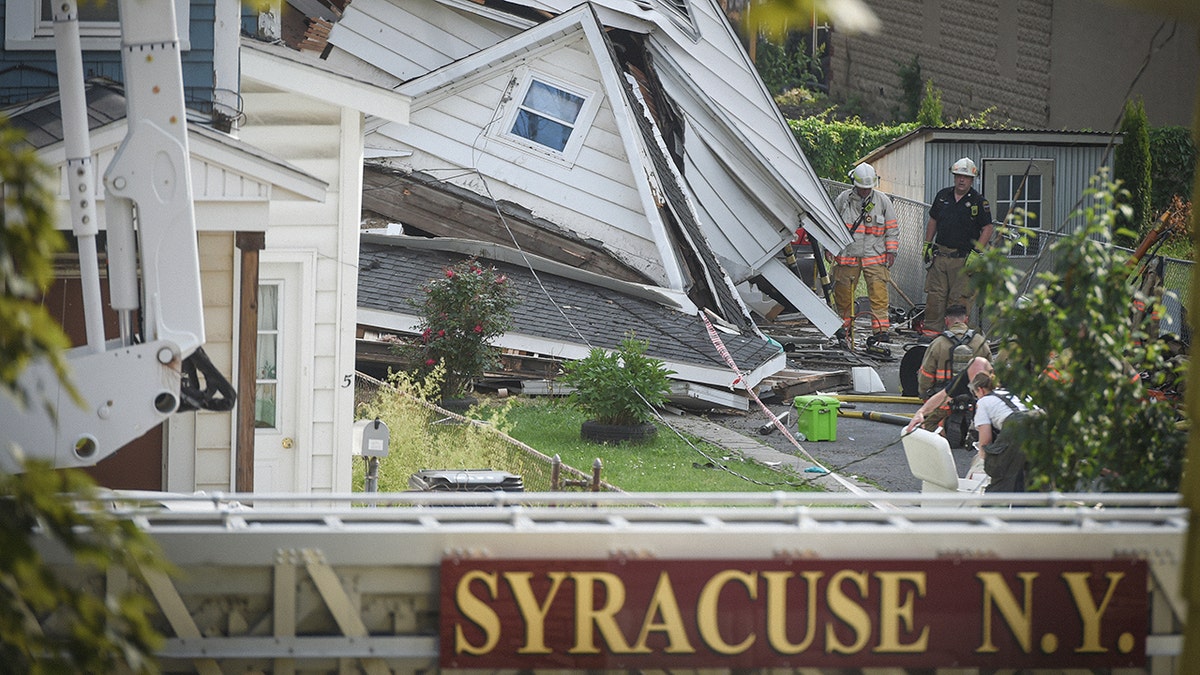Syracuse fire on scene of house explosion