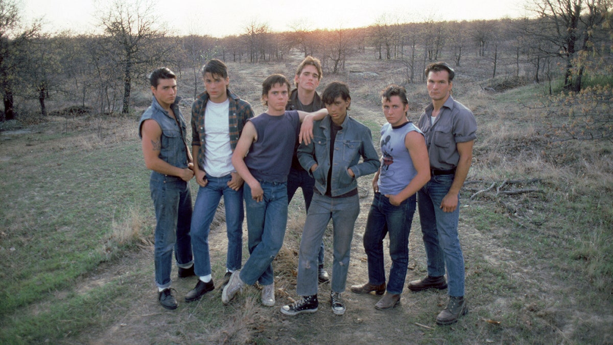Tom Cruise, Rob Lowe, Thomas C. Howell, Matt Dillon, Ralph Macchio, Emilio Estevez and Patrick Swayze on the set of The Outsiders, directed by Francis Ford Coppola.?