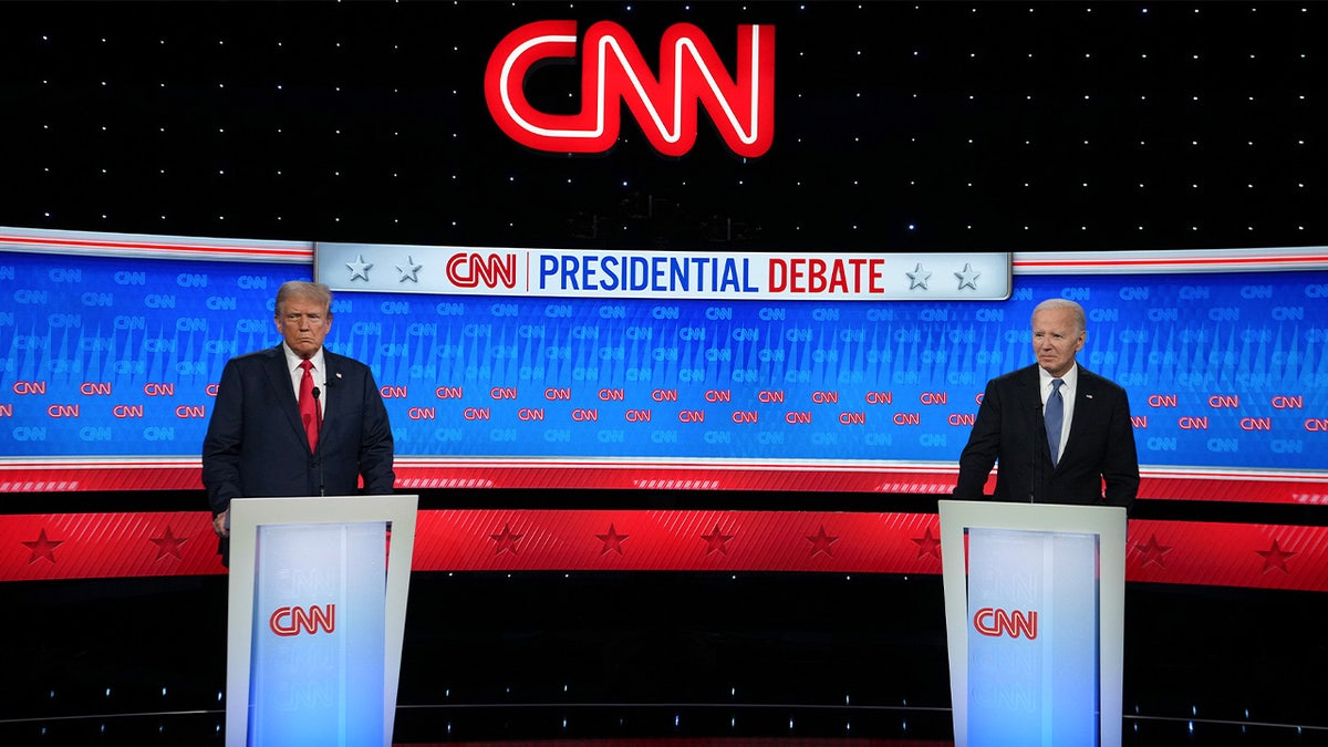 Trump and Biden on stage in CNN debate from June 27, 2024